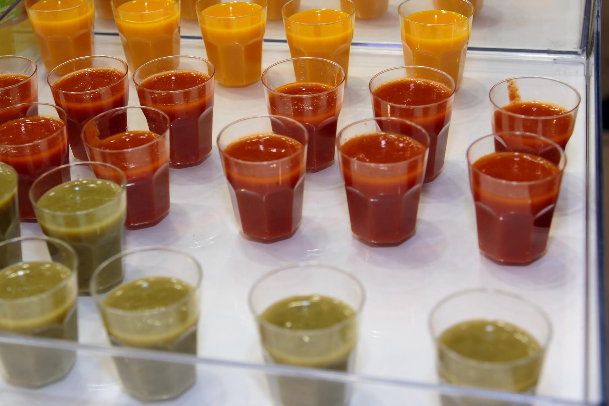 Trayline with portioned sauces in laboratory lighting
